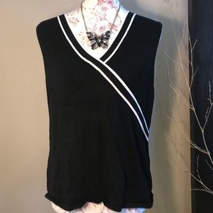 Black and white sweater vest 🧚🏻‍♀️